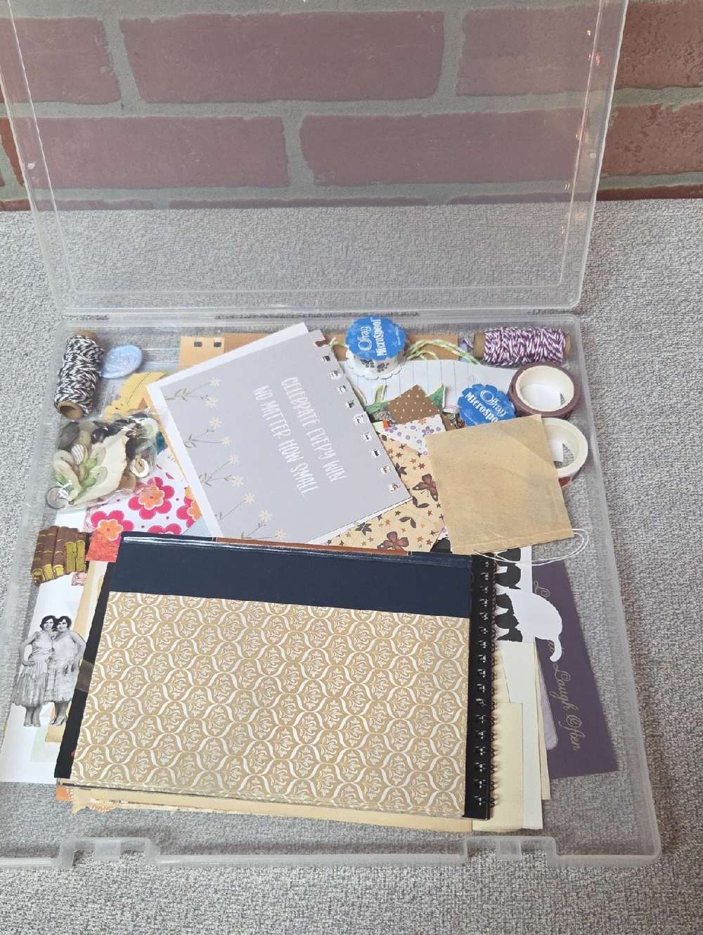 Clear Plastic Craft Storage Box with Assorted Junk Journal Items